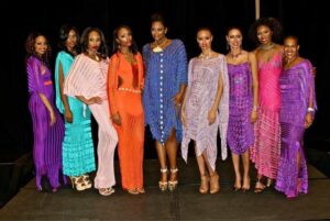 Fashion designer Michele Walden Mcphee and models wearing MooreMichi collection